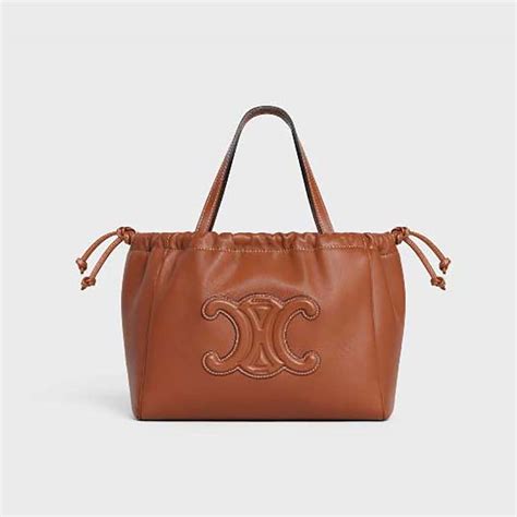 Women's Small cabas Drawstring cuir Triomphe in smooth .